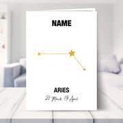 aries birthday card shown in a living room